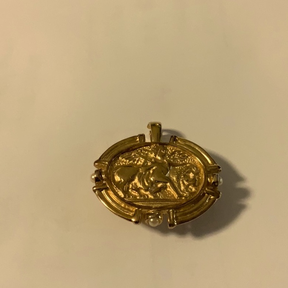 Brooch, Pendant. Pearl and Gold Plate Ivanka’s  piece.